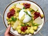 GNOCCHI A LA CREME DE PISTACHE, CHIPS DE JAMBON CRU, MOZZARELLA DI BUFALA, PARMESAN AOP